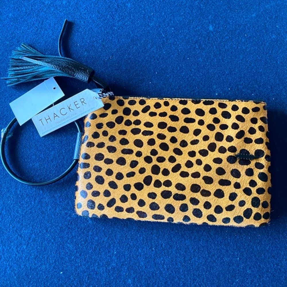 THACKER wristlet!Real fur, size works @ most stadiums/slips on your wrist 4 ease